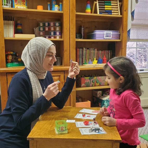 Therapist working with child